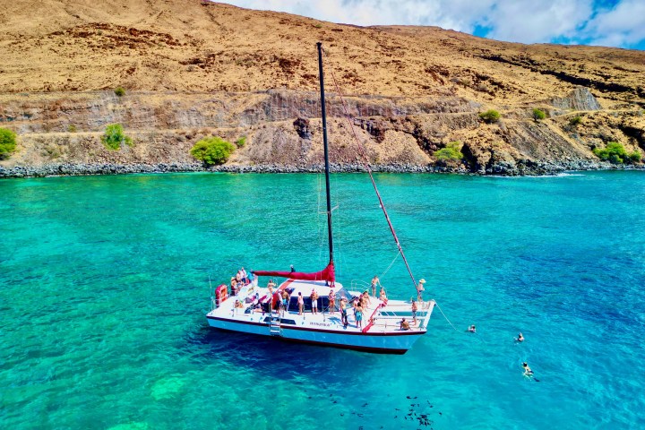 a small boat in a large body of water