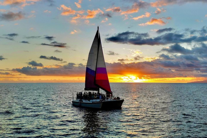 a small boat in a large body of water